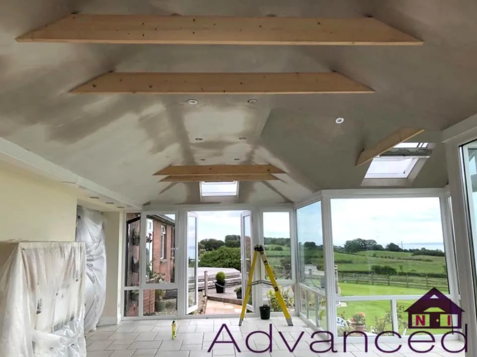 Conservatory interior during insulated roof installation