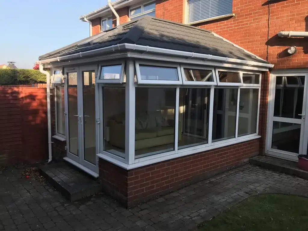 White conservatory before a solid roof conversion in Carnmoney