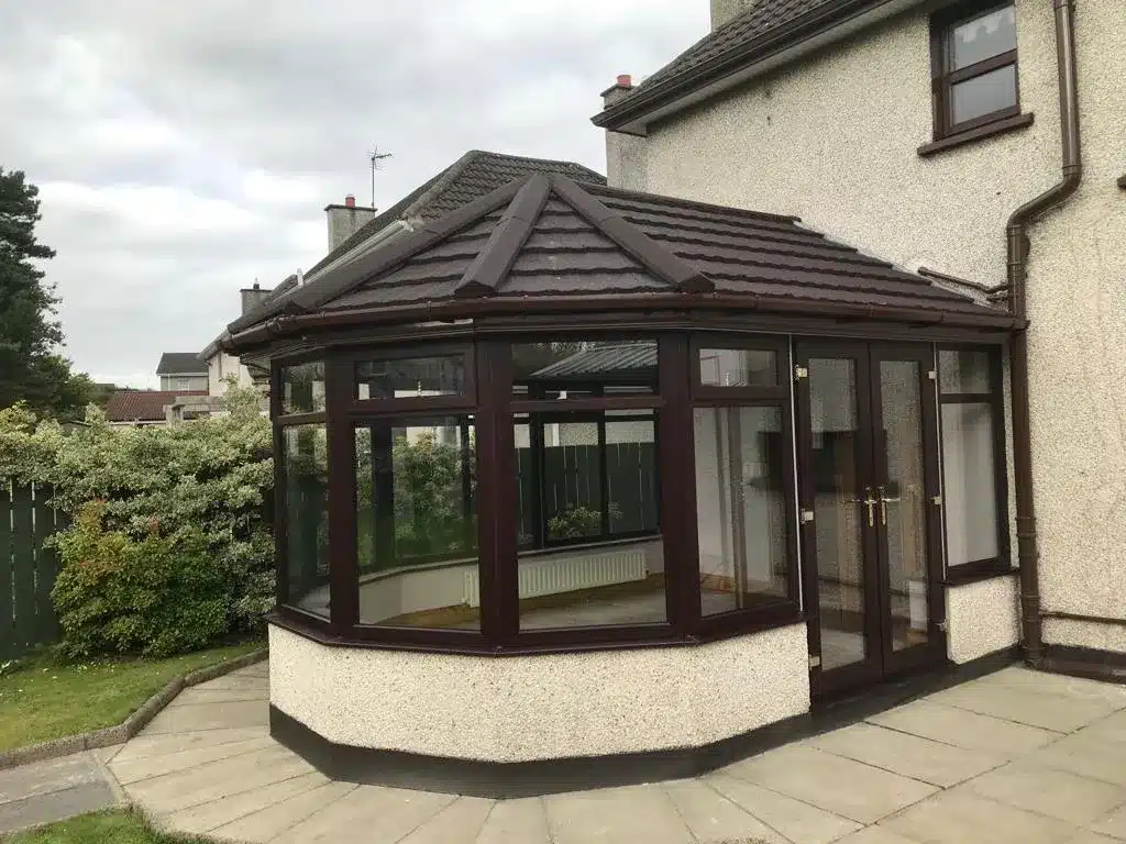 Tiled conservatory roof conversion exterior, dark grey finish